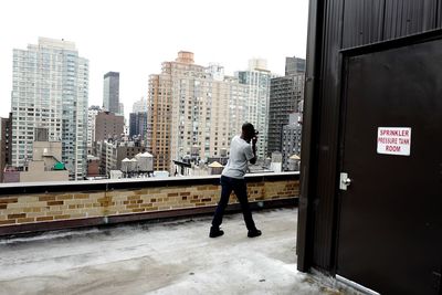 Woman standing in city