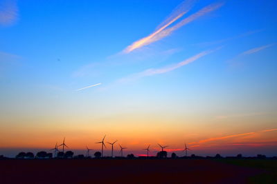 Scenic view of silhouette landscape against sky during sunset