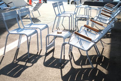 High angle view of empty chairs on table