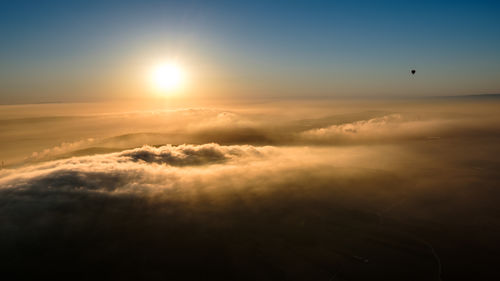 Aerial view of cloudscape against sky during sunset