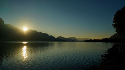 Scenic view of sea against sky at sunset