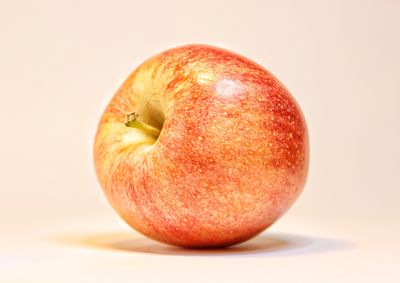 Close-up of apple against white background