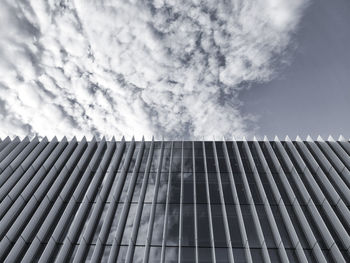 Low angle view of skyscraper against sky