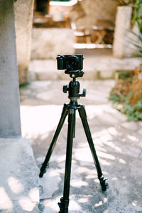 High angle view of camera on footpath