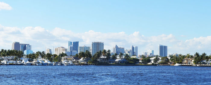 City by sea against sky