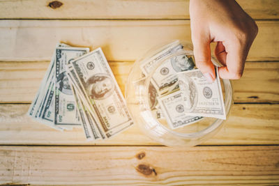 Close-up of hand holding paper