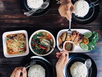 Directly above shot of person preparing food on table