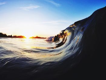 Scenic view of sea at sunset