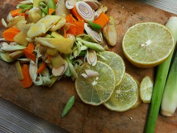 High angle view of chopped fruits on cutting board