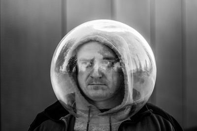 Close-up portrait of man wearing mask