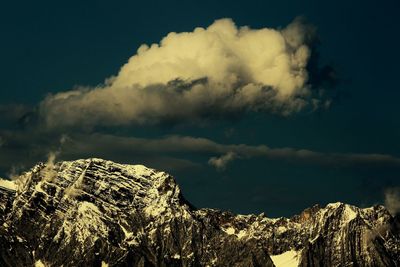 Low angle view of rocks against sky