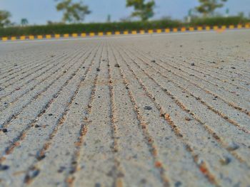 Close-up of cobblestone against sky