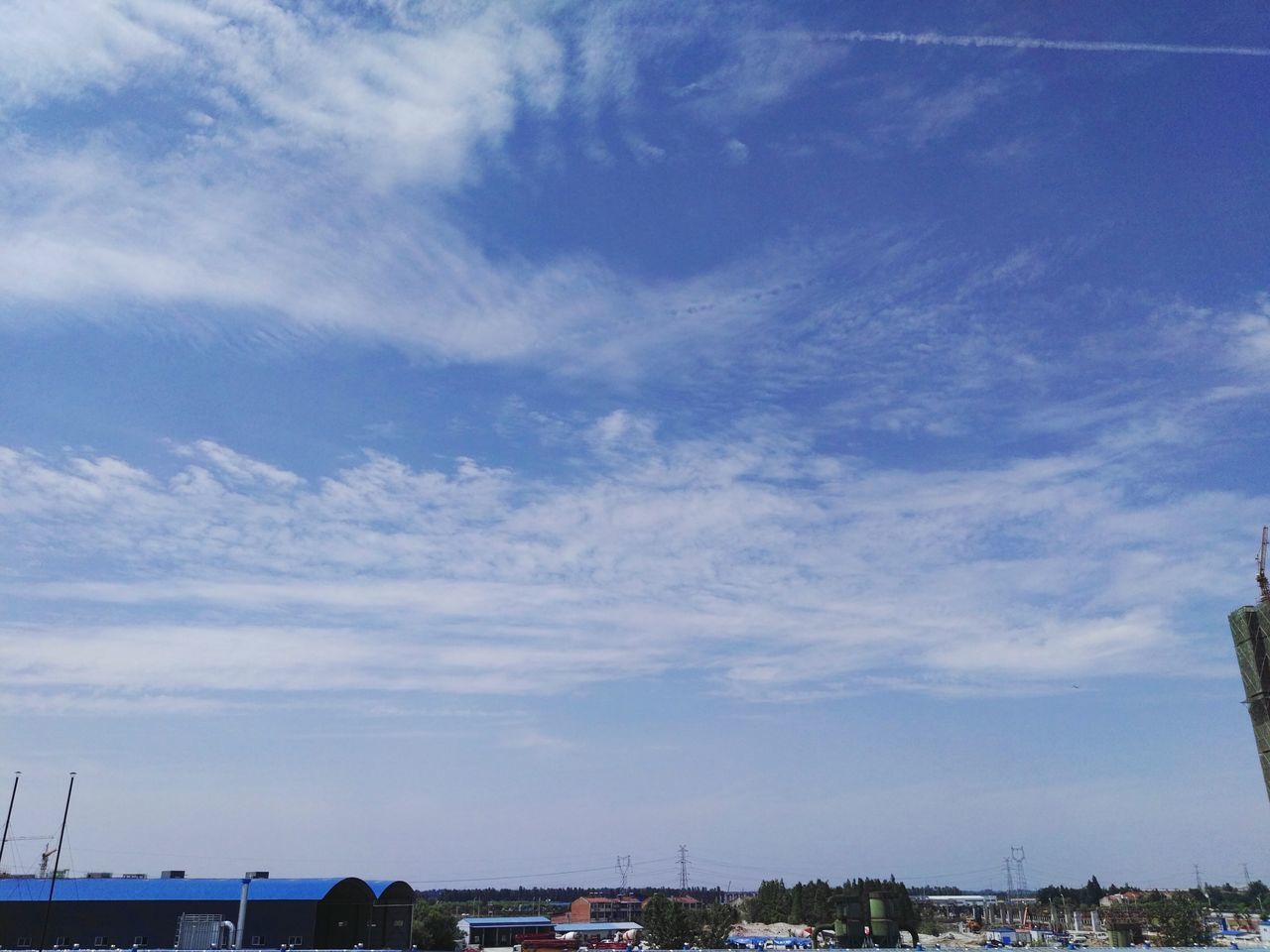 VIEW OF CITY AGAINST BLUE SKY