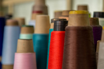 Close-up of colorful thread spools
