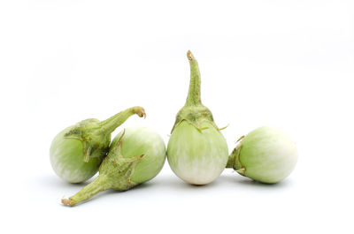 Close-up of fruits against white background