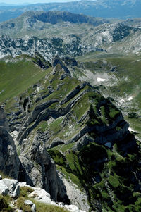 High angle view of water flowing through rocks