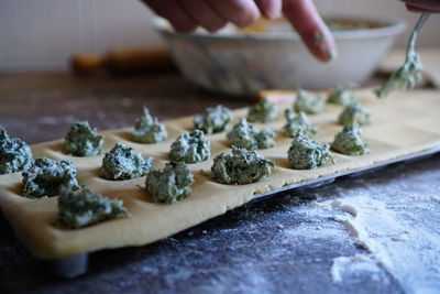 Close-up of person preparing food