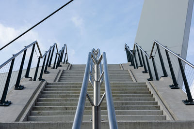 Low angle view of empty steps against sky