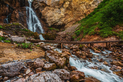 Wild river landscape in austrian alps. stierlochbach waterfall.