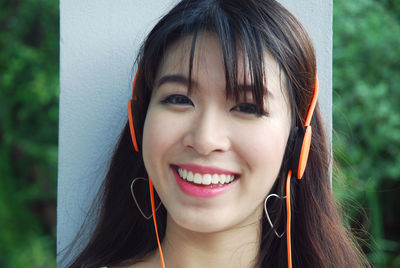 Close-up portrait of a smiling young woman