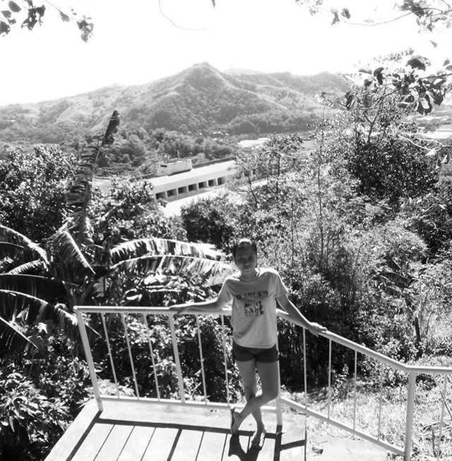 mountain, tree, railing, rear view, lifestyles, built structure, leisure activity, building exterior, architecture, men, person, nature, casual clothing, fence, growth, full length, standing, day