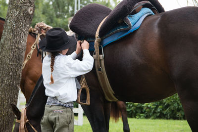 Little girl and her horse