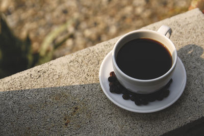High angle view of black coffee on table