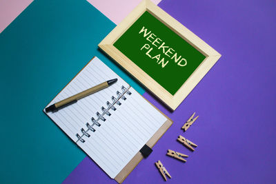 High angle view of information sign on table