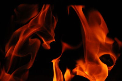 Close-up of bonfire against black background