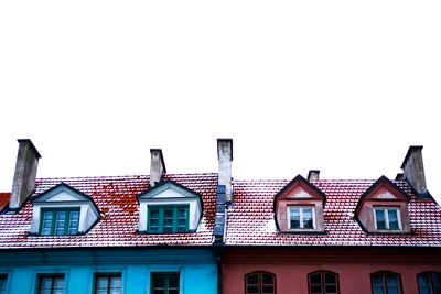 Houses against clear sky