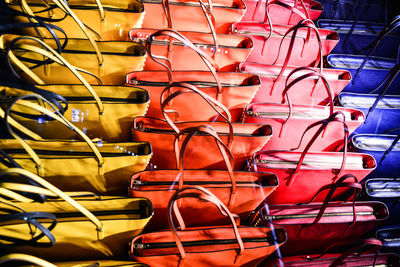 Full frame shot of multi colored purses for sale in store