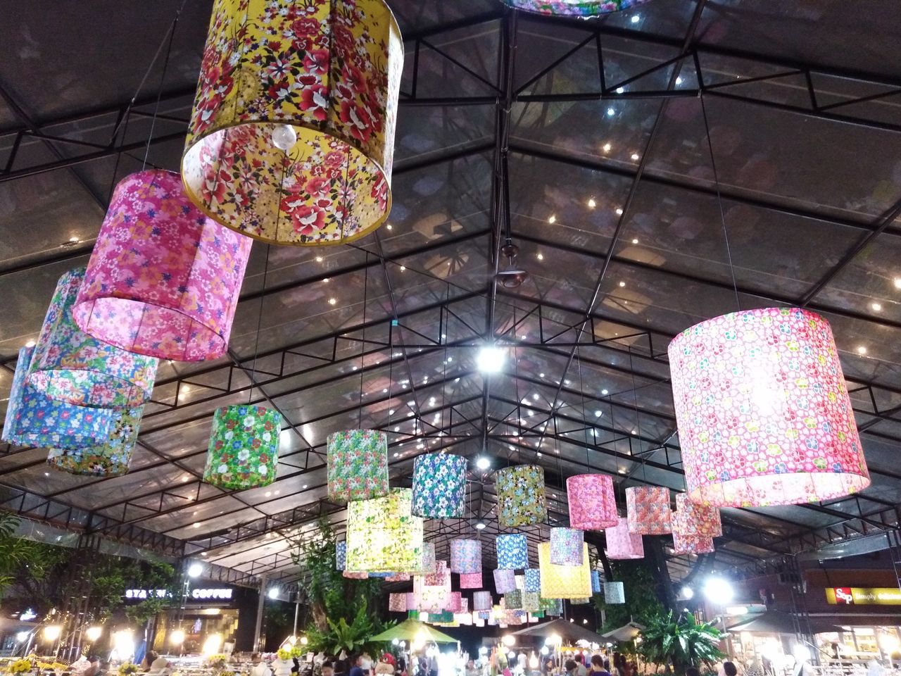 LOW ANGLE VIEW OF LANTERNS HANGING ON CEILING