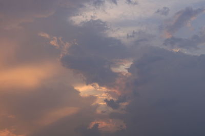 Low angle view of dramatic sky during sunset