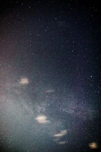 Low angle view of stars in sky at night