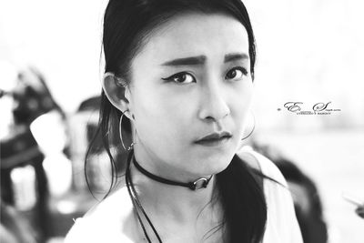 Close-up portrait of young woman