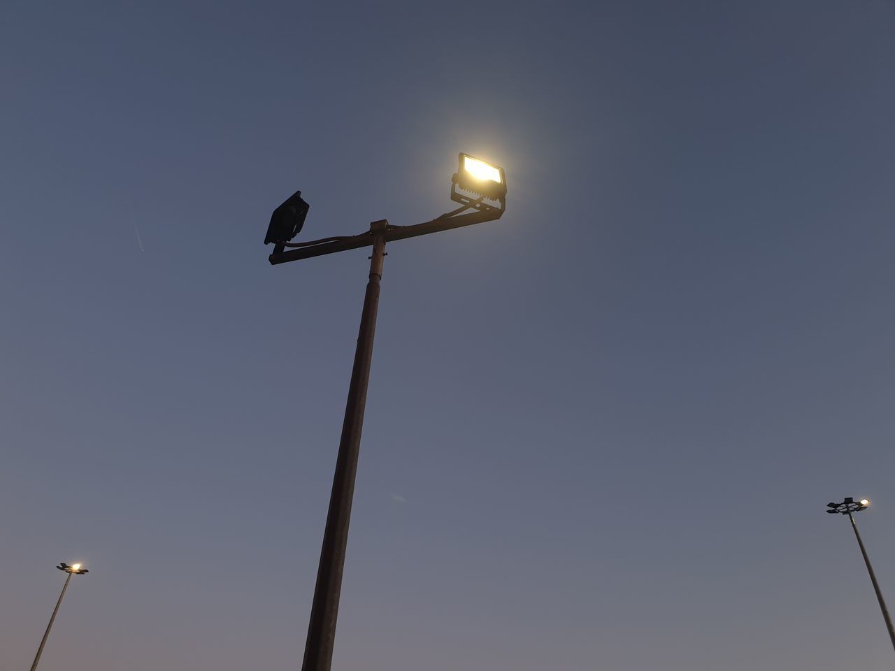 LOW ANGLE VIEW OF STREET LIGHT AGAINST CLEAR SKY