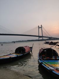 View of suspension bridge over sea