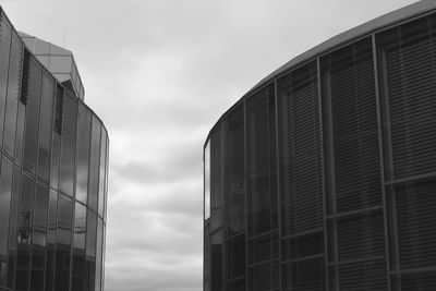 Low angle view of office building against sky