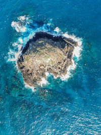 Drone shot of sugar loaf, an isolated rock, admiralty islands near lord howe island, nsw, australia.