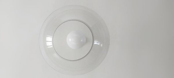 Directly below shot of electric lamp against white background