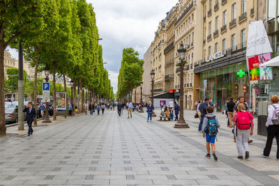 People walking on city street