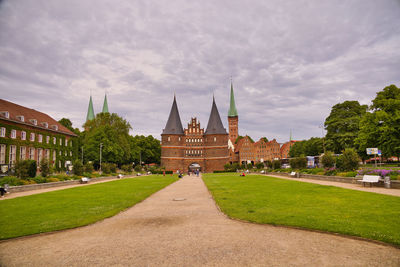 View of historic building against cloudy sky