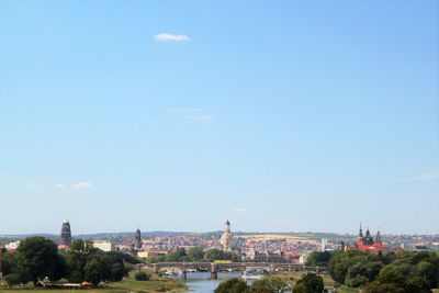 Buildings in city against sky