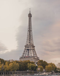 View of tower against cloudy sky