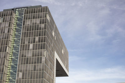 Low angle view of modern building against sky