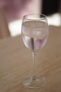 Close-up of wineglass on table