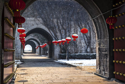 Red lanterns hanging on wall