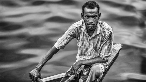 Portrait of man on boat in sea