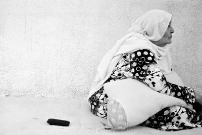 Close-up of woman standing in pond