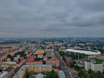 High angle view of buildings in city against sky